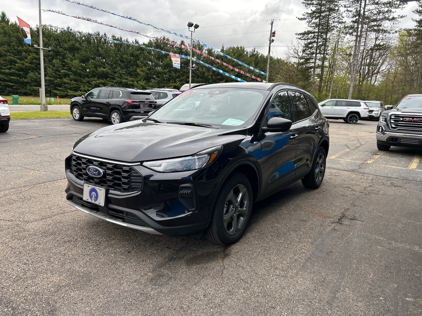 2025 Ford Escape ST-Line in Black — front three-quarter view