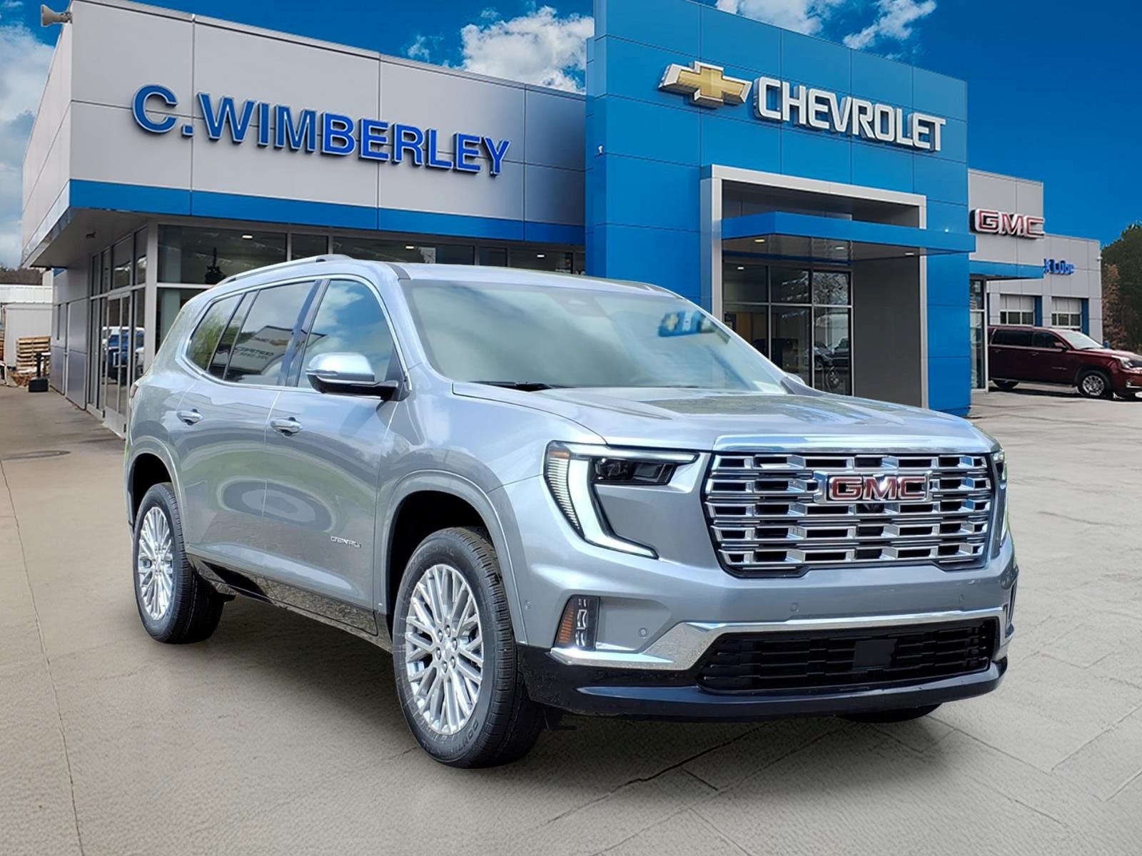 2026 GMC Acadia Denali in Sterling Metallic — front three-quarter view