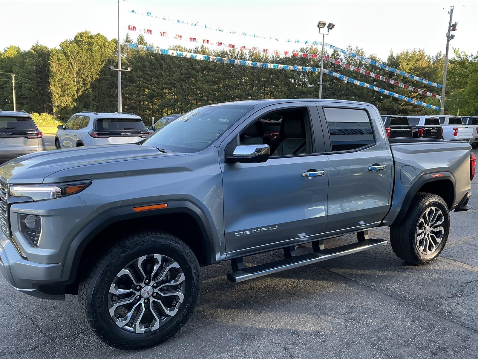 2026 GMC Canyon Denali in Sterling Metallic — front three-quarter view