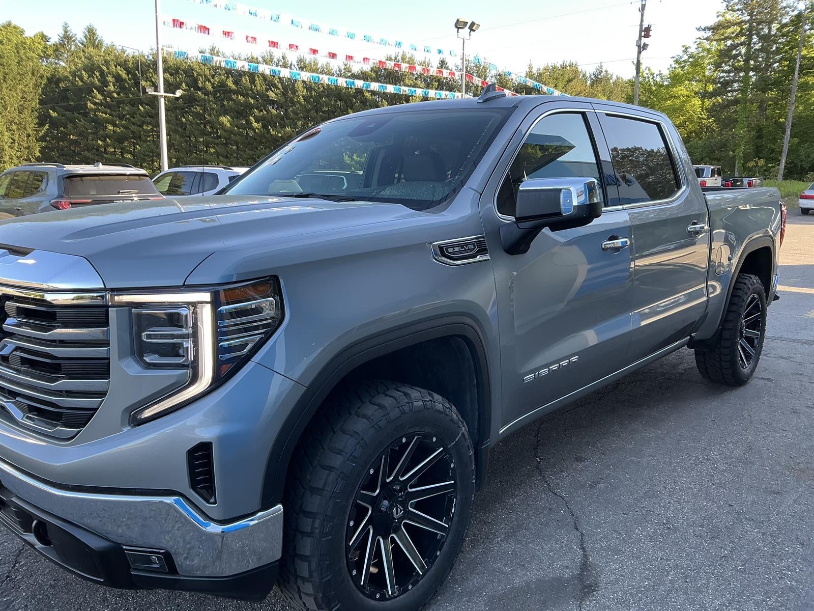 2025 GMC Sierra 1500 SLT in Sterling Metallic — front three-quarter view