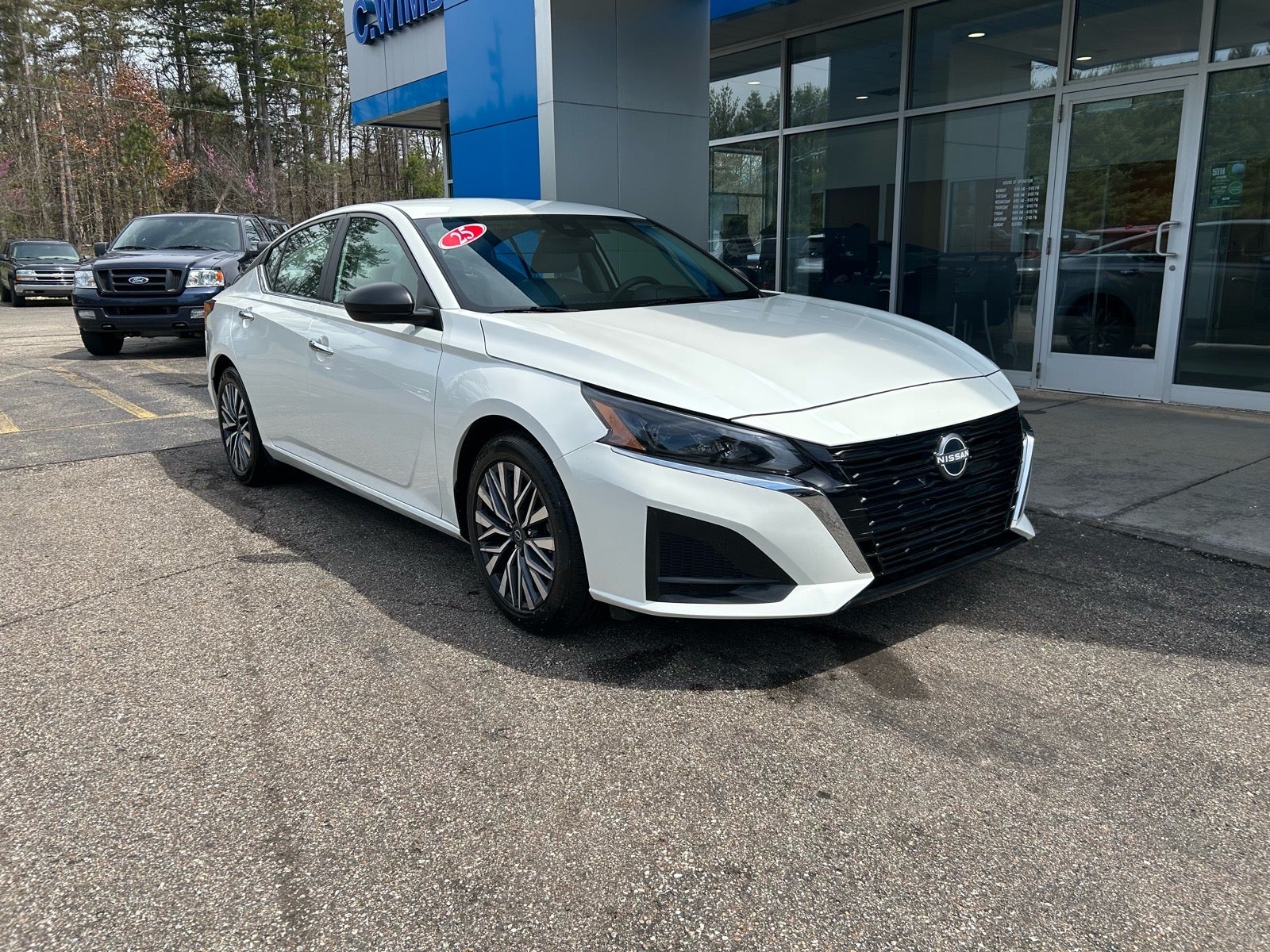 2025 Nissan Altima SV in White — front three-quarter view
