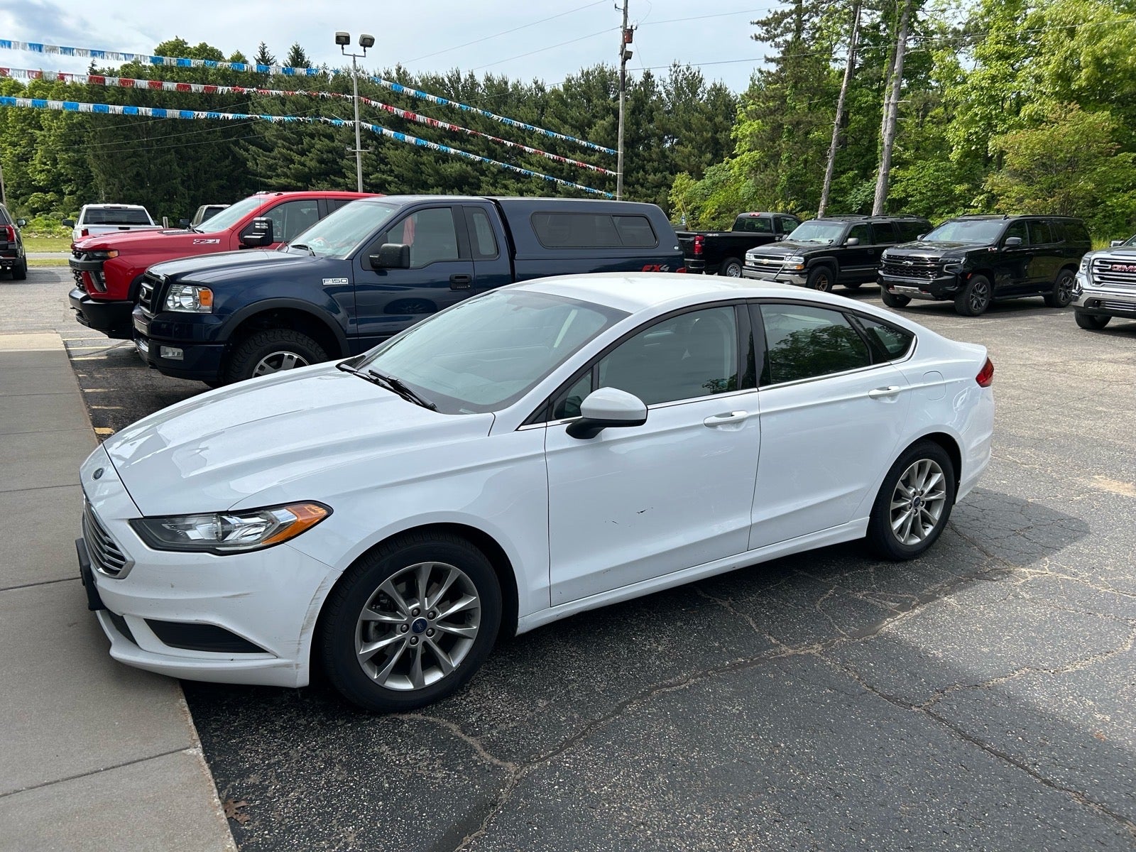 2017 Ford Fusion SE in White — front three-quarter view