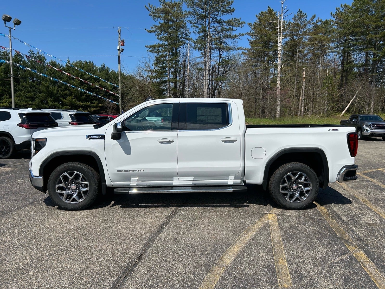 2026 GMC Sierra 1500 — rear three-quarter view