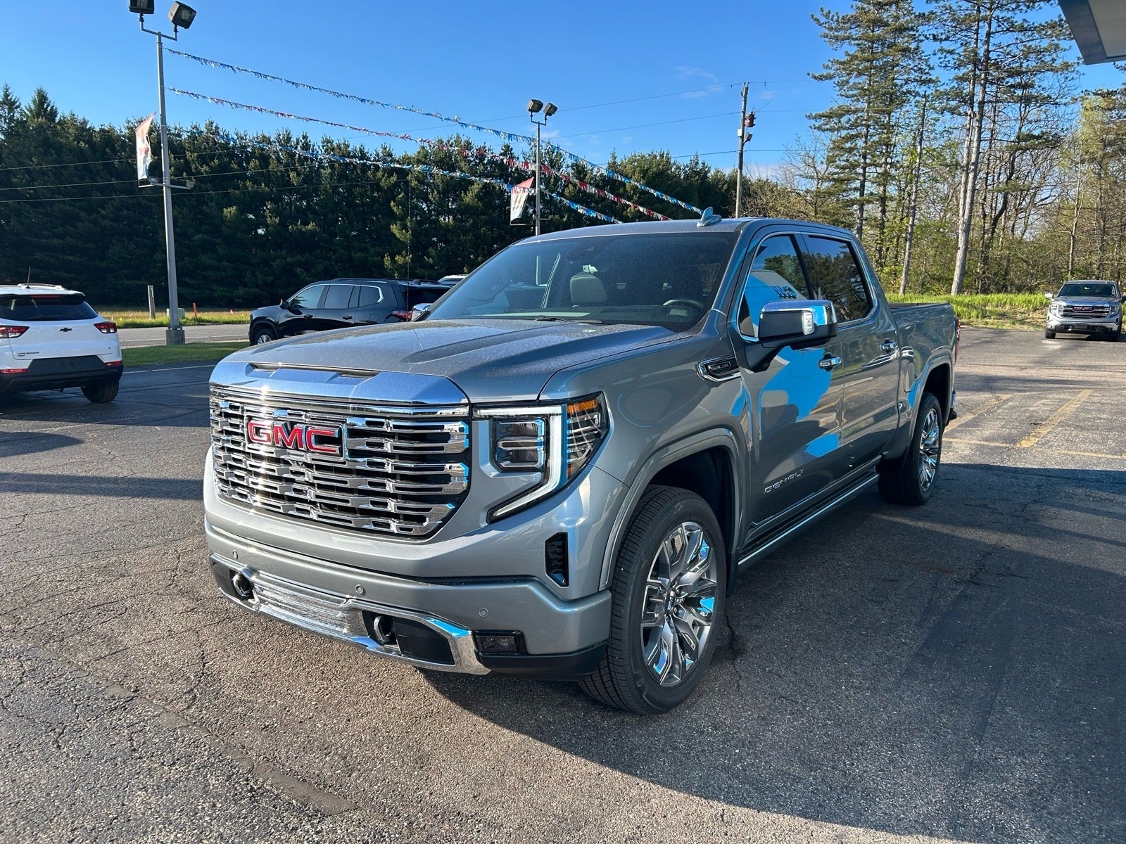 2026 GMC Sierra 1500 Denali in Sterling Metallic — front three-quarter view