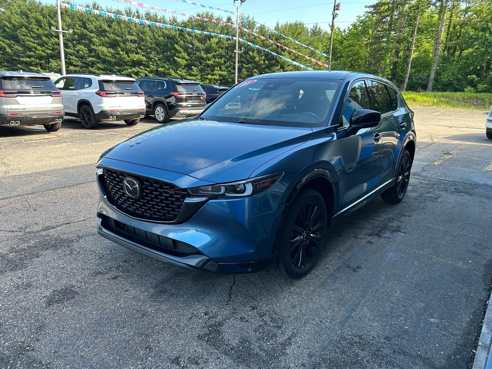 2022 Mazda Mazda CX-5 2.5 Turbo in Blue — front three-quarter view