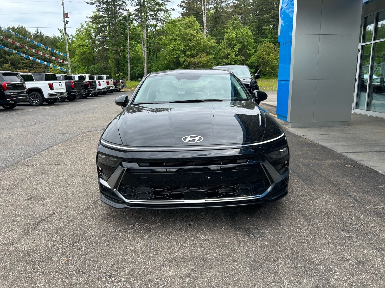 2025 Hyundai Sonata SEL in Black — front three-quarter view